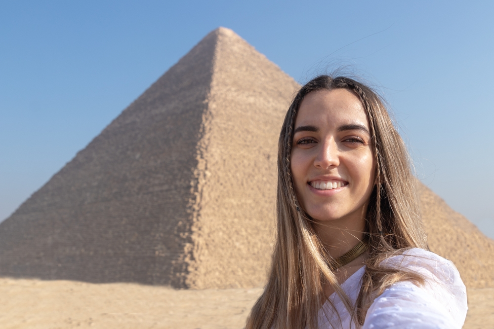 woman at pyramids
